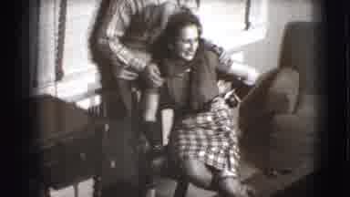 Joliet Illinois USA (1941): People Sitting Down And Laughing Watching The