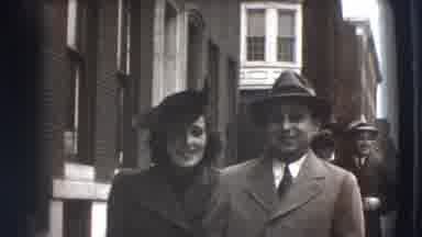 Joliet Illinois USA (1941): Dapper Couple Walking Down The Street From Way Back In