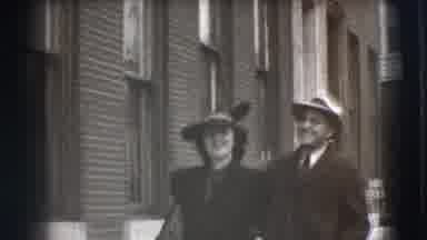 Joliet Illinois USA (1941): Well Dressed Couple Smiling And Walking Down A Brick