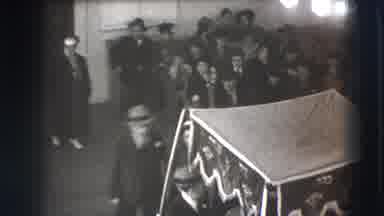 Joliet Illinois USA (1941): A Black White Of A Couple Walking To Take A Seat