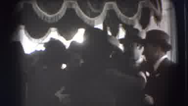 JOLIET ILLINOIS USA-1941: A Man In A Hat Bow Tie And Dress Coat Smiles And