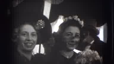 Joliet Illinois USA (1941): Men In Suit And Women In Gown Are Gathered Together