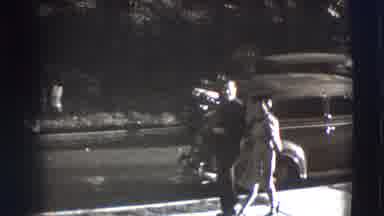 Joliet Illinois USA (1941): A Couple Is Walking Around The Town To Have A Good