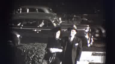 Joliet Illinois USA (1941): Man And Woman Arm In Arm Walk On Front Walk Away From