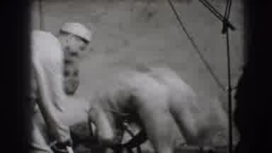 Joliet Illinois USA (1941): A Group Of Men Playing Around And Laughing A Lot