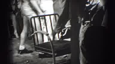 Joliet Illinois USA (1941): A Man Crying With Torn Clothes Chair Couples Enjoying
