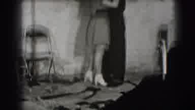 Joliet Illinois USA (1941): Black And Video With A Man And Woman In A Warm Embrace