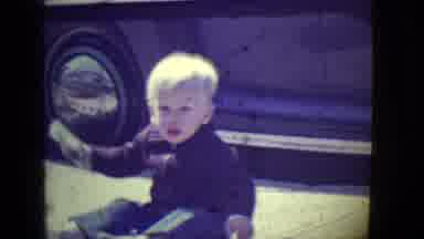 East Orange New Jersey (1946): Little Boy Abruptly Stands Up From His Seated