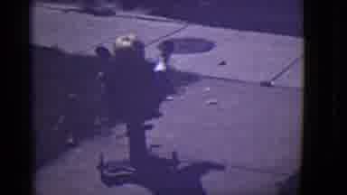 East Orange New Jersey (1946): A Toddler Riding A Bike On The Walkway Near A Car
