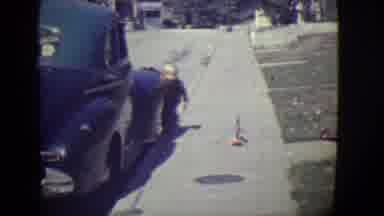 East Orange New Jersey (1946): Little Boy Holds Onto Car Parked Near The Sidewalk