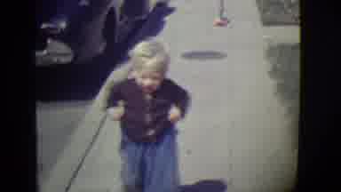 East Orange New Jersey (1946): Woman Leans Into A Car While A Baby Toddles Down
