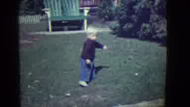 East Orange New Jersey (1946): Little Boy Slowly Walking Up A Small Incline In
