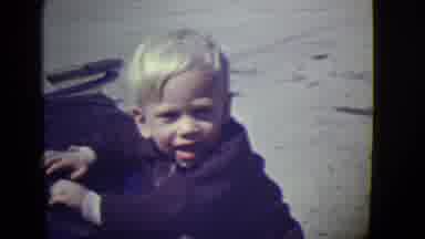 East Orange New Jersey (1946): Woman In Dress And Blonde Haired Little Boy Waving