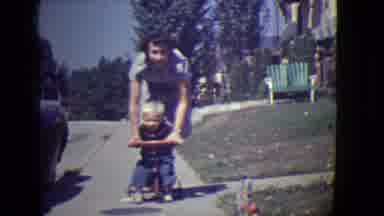 East Orange New Jersey (1946): A Little Boy With Blond Hair Riding On A Bicycle