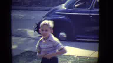 East Orange New Jersey (1946): Little Boy Stands Outside A Black Car Talking To