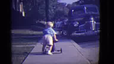 East Orange New Jersey (1946): Little Boy Pushing A Small Bicycle When Another