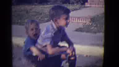 East Orange New Jersey (1946): A Big Brother And Smaller Boy Outside On The Street