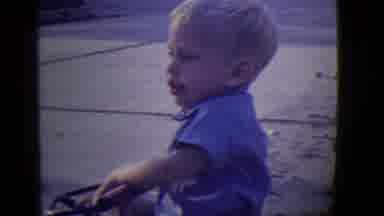 East Orange New Jersey (1946): Little Boy Sits And Watches Another Boy Pass On His
