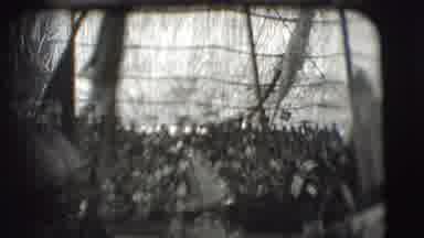 Ringling Brothers Sarasota Florida (1948): People In Tall Hats Are Walking In A