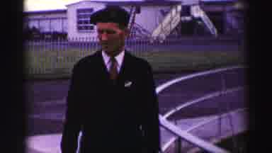 United Kingdom (1952): Shows A Man In An Army Beret And Some Army Vehicles Driving
