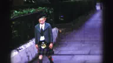 United Kingdom (1952): Little Boy Dressed In Scottish Kilt And Hat Walks Down The