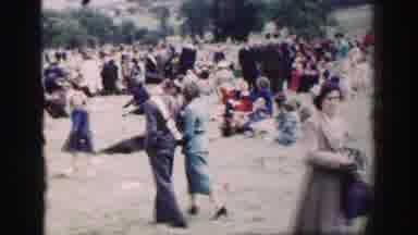 UNITED KINGDOM-1952: A Couple Walking On A Hill Full Of People Accommodated