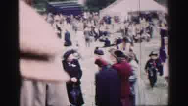 United Kingdom (1952): A Public Square Celebration With People Dressed In
