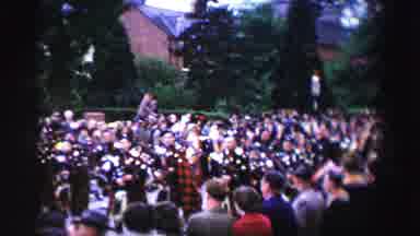 UNITED KINGDOM-1952: Bagpipe Band Marches In Parade On A Bright Sunny Day