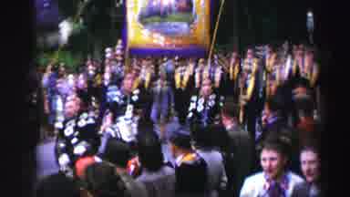 United Kingdom (1952): A Large Group Of People Gather Around To Watch A Parade
