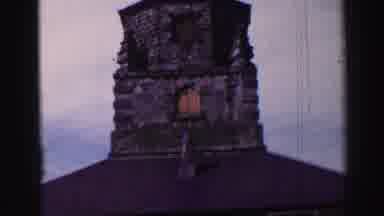 UNITED KINGDOM-1952: Looking At An Ancient Stone Building In The Background
