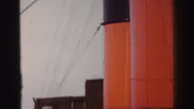 United Kingdom (1952): People Are On Board A Big Boat With A Red Smoke Top
