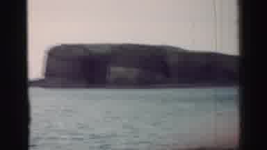 United Kingdom (1952): View Of A Large Body Of Water With A Large Cliff In The