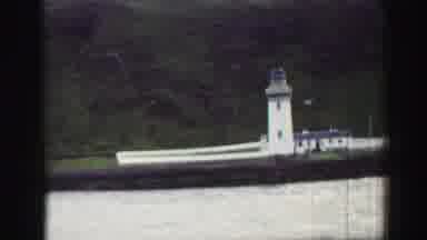 United Kingdom (1952): Harbor Footage Of Lighthouse And Surrounding Docks On An