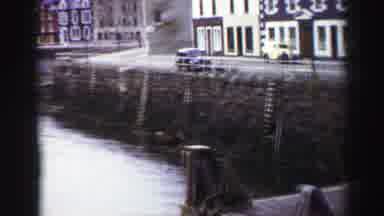 United Kingdom (1952): Scottish Cityscape With A Parade Involving Bagpipes And