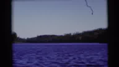 Baraboo Wisconsin USA (1953): Sailing On A River With Trees Around The Blue Water