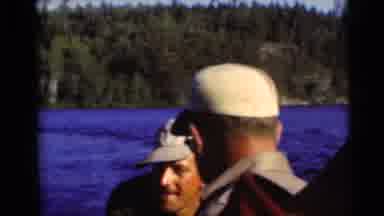 Baraboo Wisconsin USA (1953): Two Men In Beige Caps Are In A Boat Fishing On The