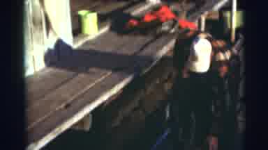 Baraboo Wisconsin USA (1953): Man In Checkered Shirt And Cap Carries Fish And