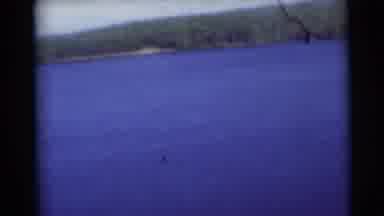 Baraboo Wisconsin USA (1953): View Of A River With Trees On The Edges Of It On A