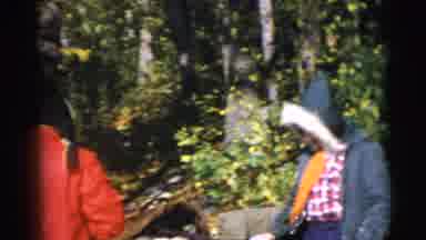 Baraboo Wisconsin USA (1953): Two Women With Their Hoods Up Are Out For A Walk In