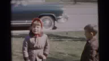 Baraboo Wisconsin USA (1953): Children Play Outside The House In A Quiet