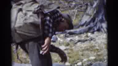 Baraboo Wisconsin USA (1953): Two Men Camping In The Woods And Checking To Make