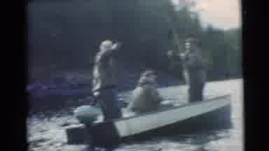 Miami Florida (1956): Three Adult Men Sitting In A Small Boat Fishing On A Large
