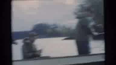 Miami Florida (1956): Group Of Men Fishing On Lake While On Long Boat Surrounded