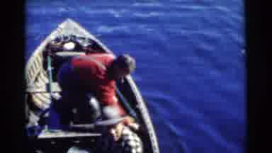 Miami Florida (1956): Middle Aged Red Shirt Man Rides With Older Checkered Flannel