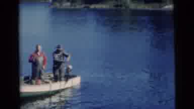 Miami Florida (1956): Two Men Pulling In A Large Fish On The Lake