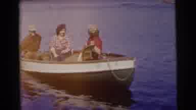 Miami Florida (1956): Woman In Middle Of Small Boat Looks Over The Edge Into The