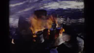Miami Florida (1956): People Outside Near Water Around A Campfire On A Sunny Day