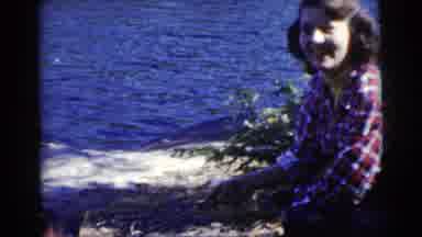 Miami Florida (1956): Woman In A Flannel Shirt Cooking Fish Over A Fire At The