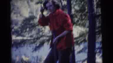 Miami Florida (1956): Two Women Laugh And Chop Wood Outside Near A River