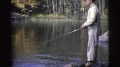 Miami Florida (1956): Well Dressed Man Standing On A Large Rock Fishing With Long
